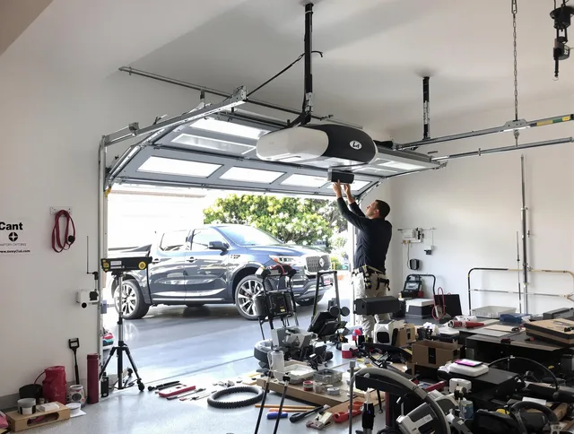 Alhambra Garage Door Repair specialist installing smart garage door opener system in Alhambra home